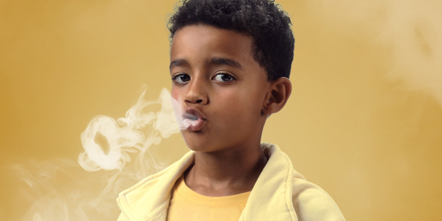 child-smoking-yellow-bkg
